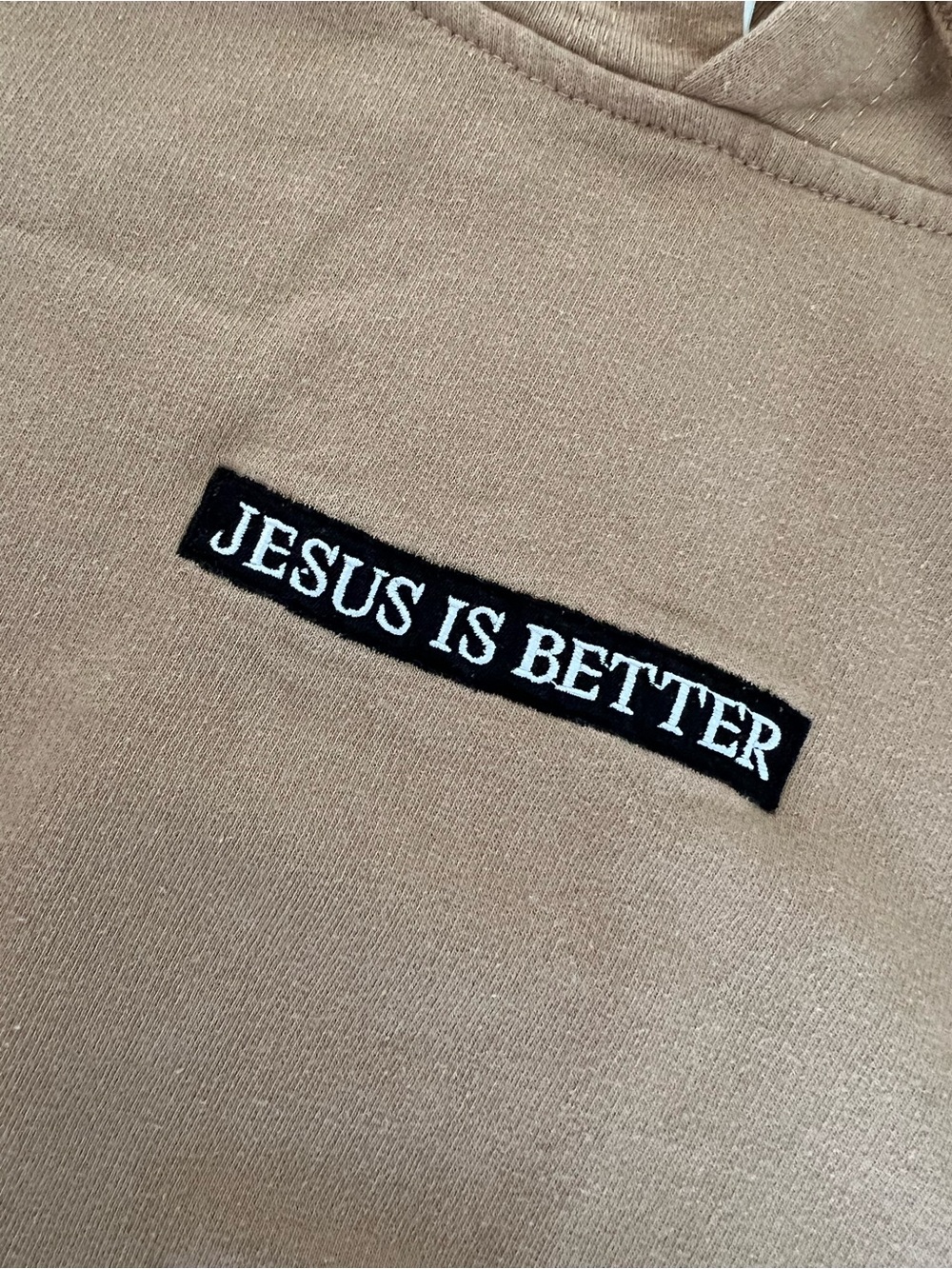 Tan 'Jesus Is Better' Pullover Hoodie | unisex - Picture 2 of 4